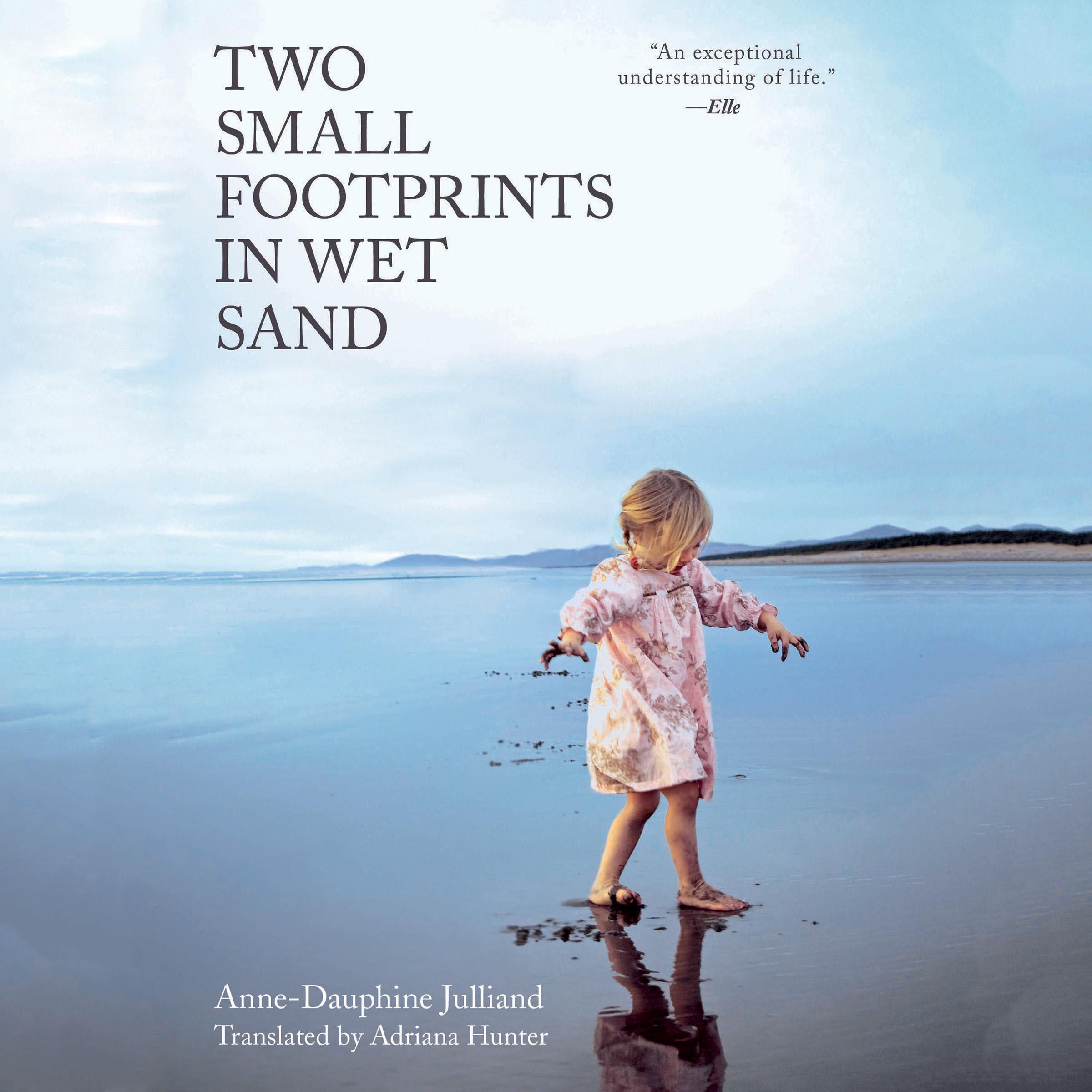 Two Small Footprints in Wet Sand
